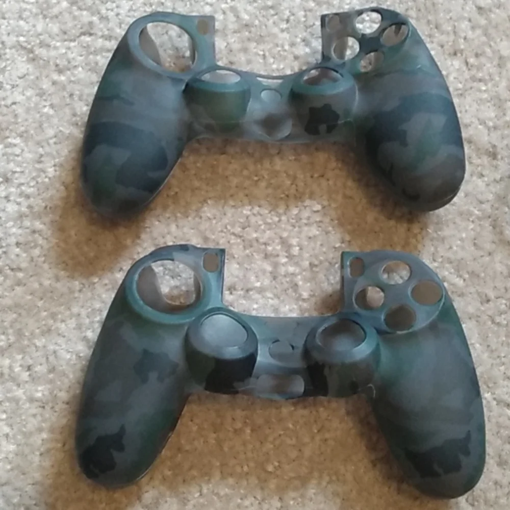 Playstation 4 controller grips. Playstation 4 charging station, adapter cord.
